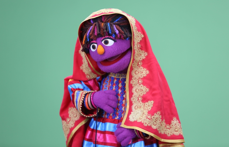 In this Wednesday, April 6, 2016 photo, Sesame Street's new Afghan character, a sassy, fun 6-year-old Afghan puppet girl called Zari takes part in a recording session ahead of her television debut on Afghanistan's local production of the show in Kabul, Afghanistan. Zari - whose name means shimmering in Afghanistans two official languages, Dari and Pashtu - made her debut on Thursday on the fifth season of Afghanistans local production of the show called Baghch-e-Simsim, which translates as Sesame Garden. Photo: AP Photo/Rahmat Gul