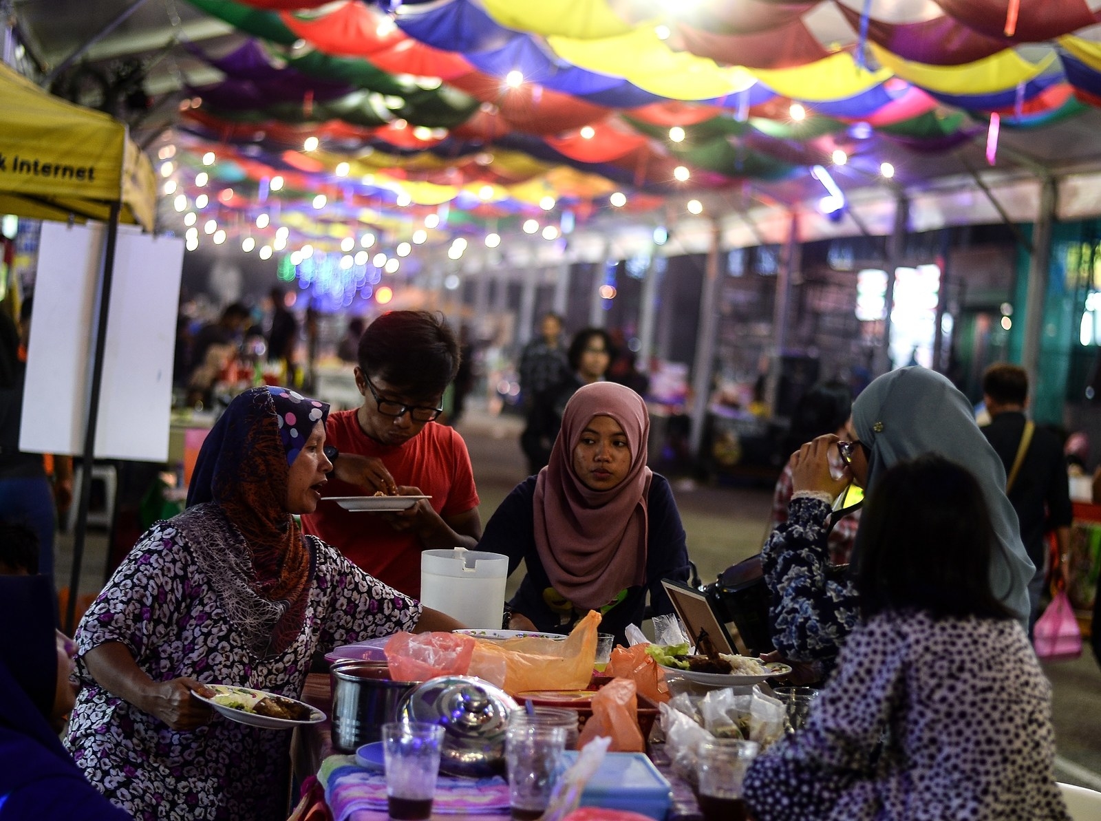 Malaysian Muslims break their fast on the first day of Ramadan. Manan Vatsyayana / AFP / Getty Images