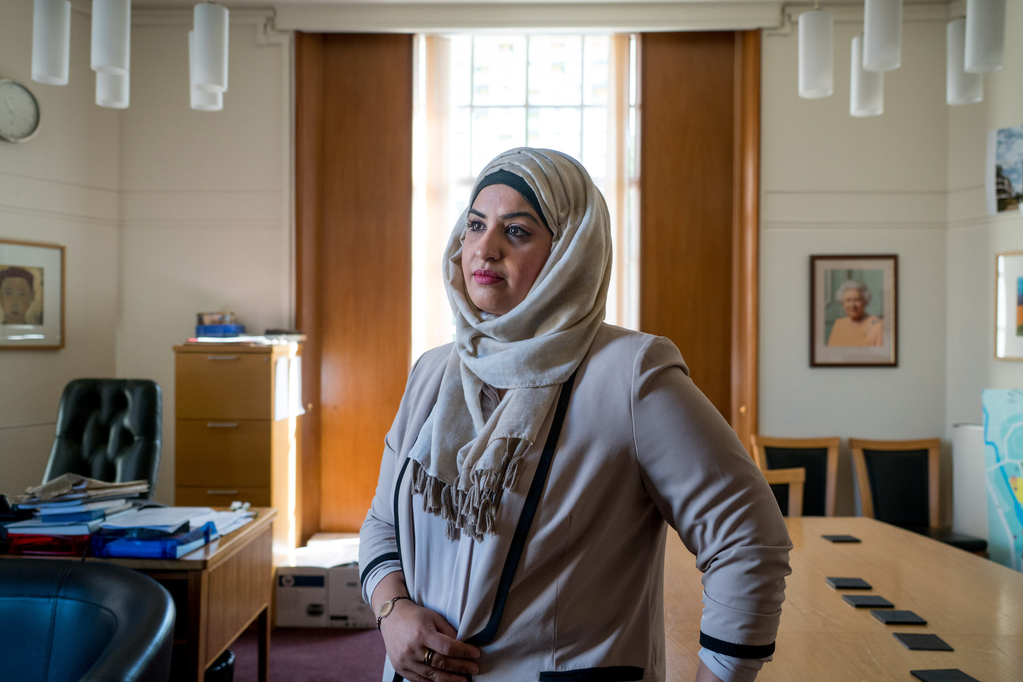 Saima Ashraf, 39, at the Barking Town Hall in London, where she is a leader in the local government. She said such an achievement would not have been possible for her as a veiled woman in her home country, France. Credit Andrew Testa/The New York Times