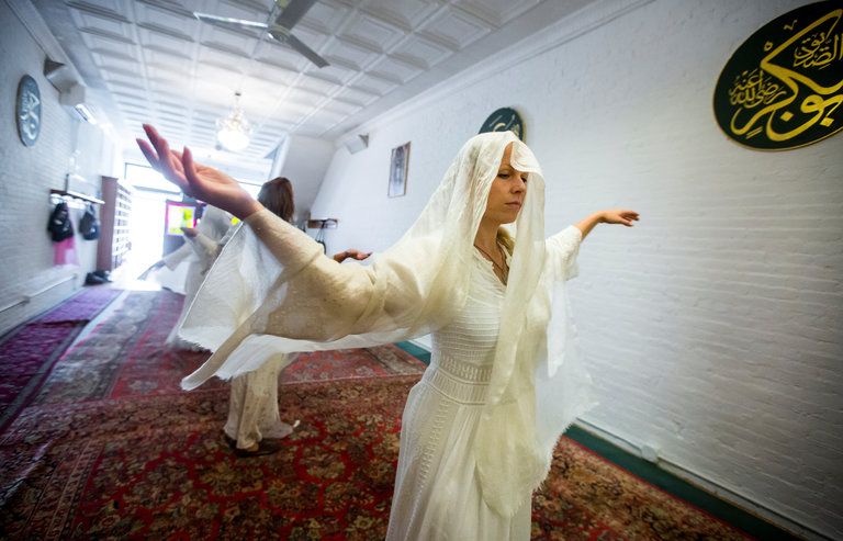 Habiba Farah during a whirling ceremony practiced by a Sufi order in TriBeCa that is led by a female sheikh. Nicole Craine/ The New York Times