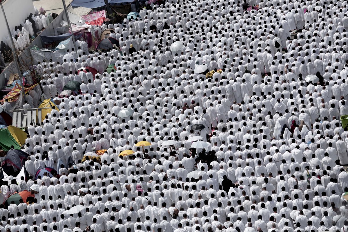 Hundreds of thousands of Muslim pilgrims pray outside Namira Mosque in Arafat, on the second and most significant day of the annual hajj pilgrimage. Nariman El-Mofty/AP