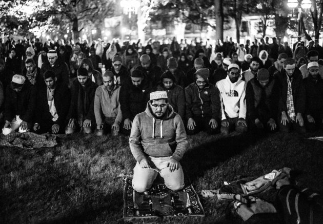 Muslim students at the University of Michigan pray the Ishaa prayer on campus. Photo/Benji Bear